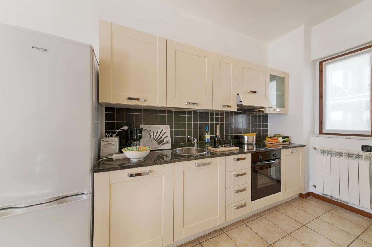 At The Lake Apartment Acquaseria Bagian luar foto