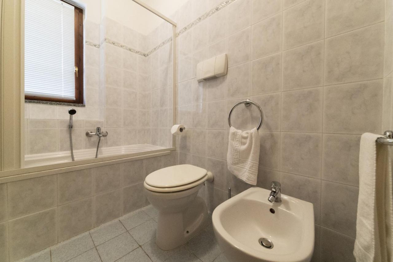 At The Lake Apartment Acquaseria Bagian luar foto